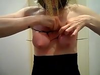 Slapping and pain for tied tits