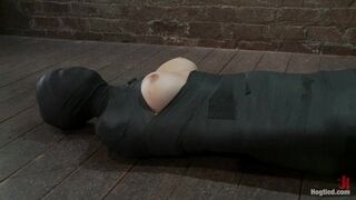 Cute little blond girl is mummified, vibrator stuck on her clit. Hung upside down to cum & cum.