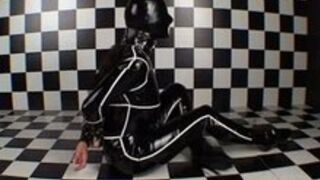 bondage rubber girl sucking cock