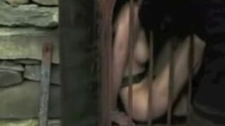 Short Haired Brunette in Dungeon