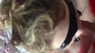 Blindfolded and gagged girl gets cum
