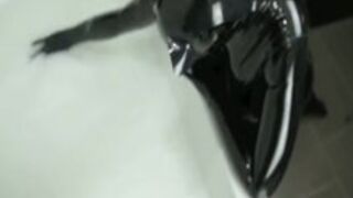 Rubber Pet girl Taking a Bath