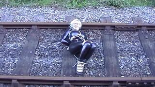 Katarina Nikita in latex on the railroad