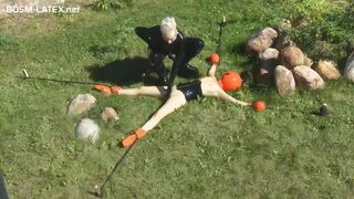 Spread Eagle in Latex Outdoors