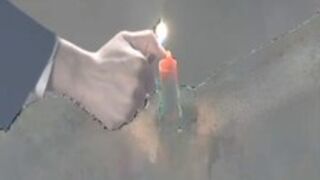 Candle in her vagina put off with Piss