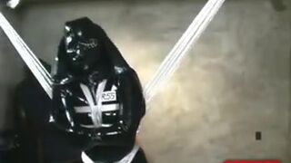 Rubber GIMP in straitjacket