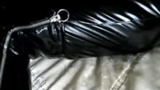 pretty broad in PVC catsuit and PVC Boots