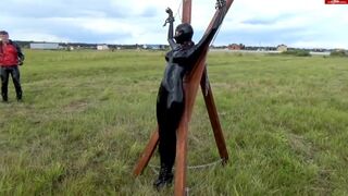 Chained and Used Latex lady Outdoors