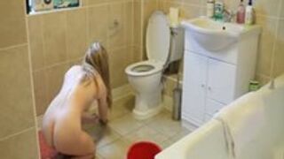 Subgirl Cleaning the Bathroom