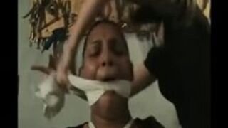 Black Submissive Bound and Gagged