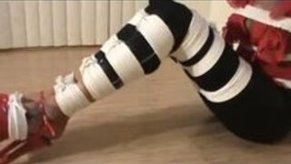 Bondage Slut in tight Ropes and ball gag