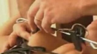 Pain slut likes to have her nipples pulled