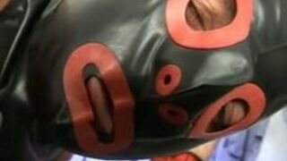 Restrained and Blindfolded Latex Girl