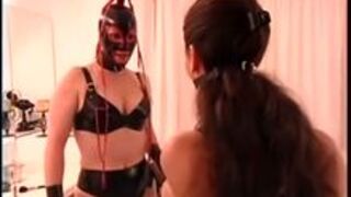 Serving her Mistress in Rubber