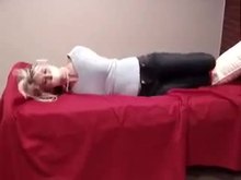 Hogtied blonde on bed