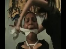Black Submissive Bound and Gagged