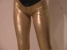 Restrained in Golden Catsuit