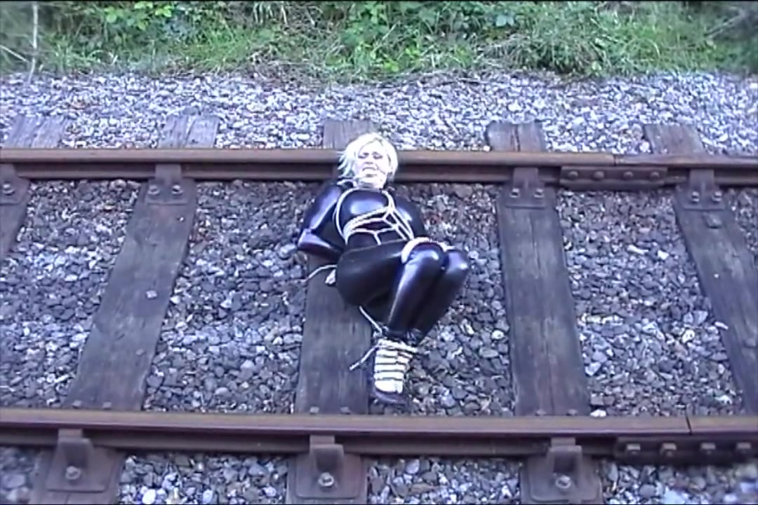 Katarina Nikita in latex on the railroad