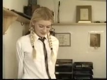 Strict Mistress Caning a schoolgirl