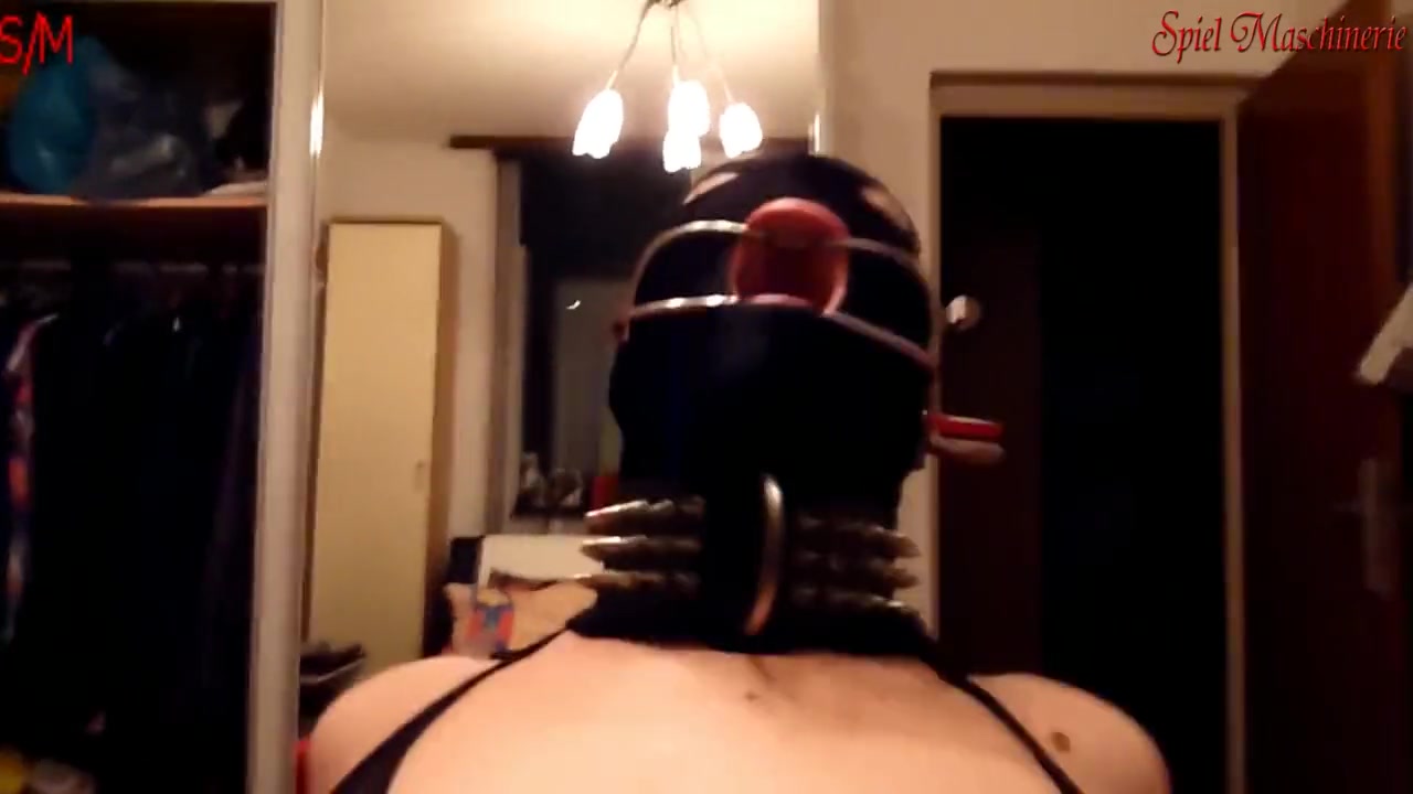 Anal boned and Hooded Slave